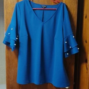 Blue blouse with pretty pearl accented sleeves